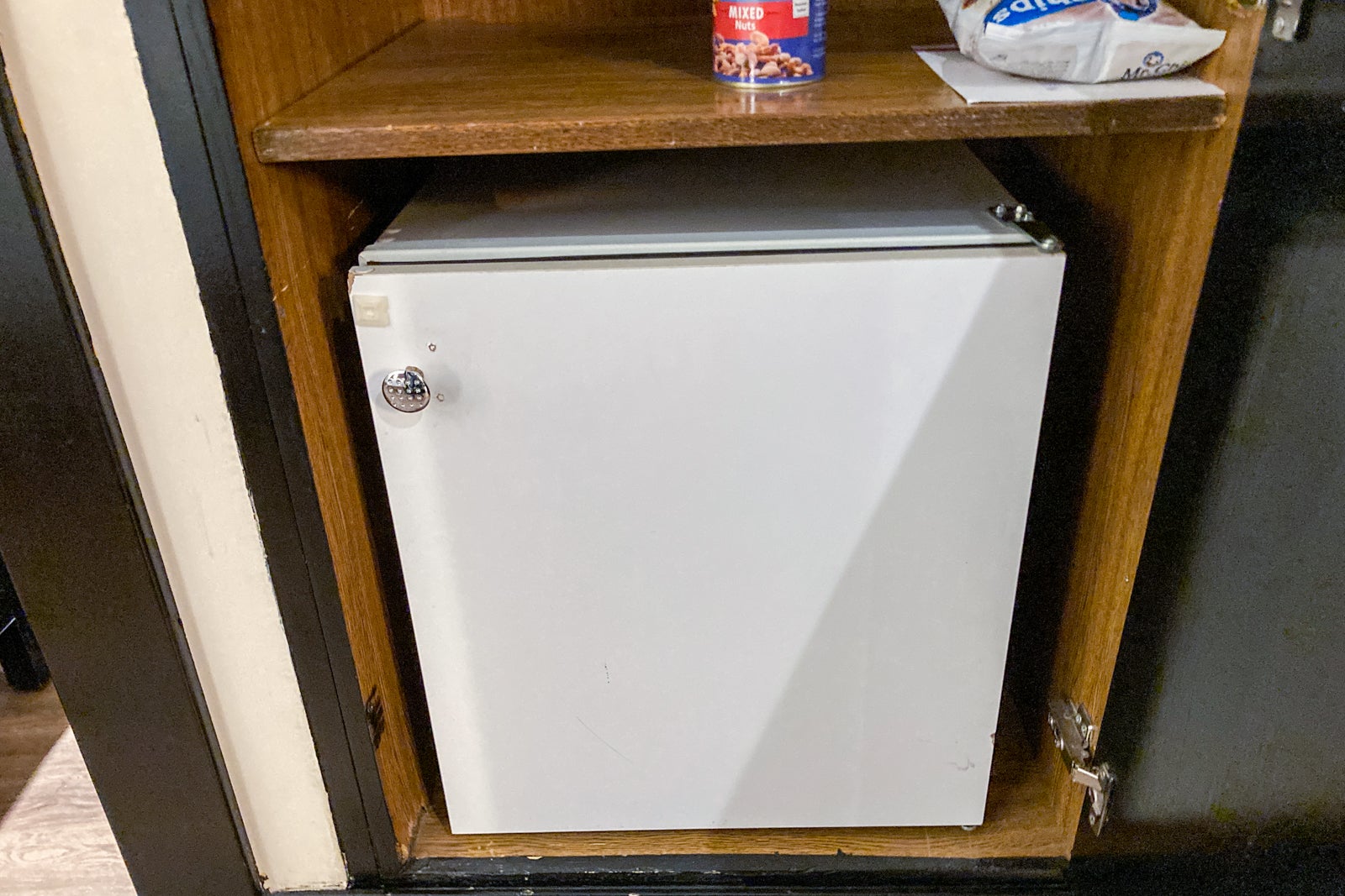a mini fridge, which is closed
