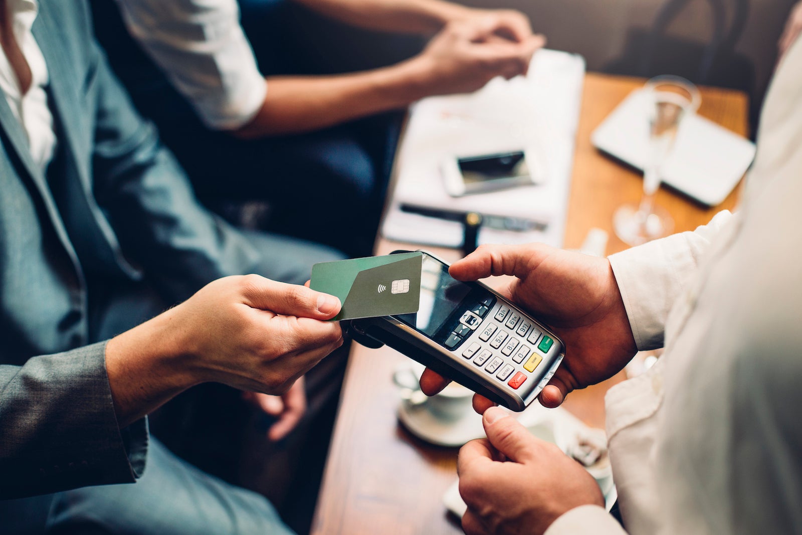 Our 2023 credit card predictions: More debt and more benefits, but they’re harder to use