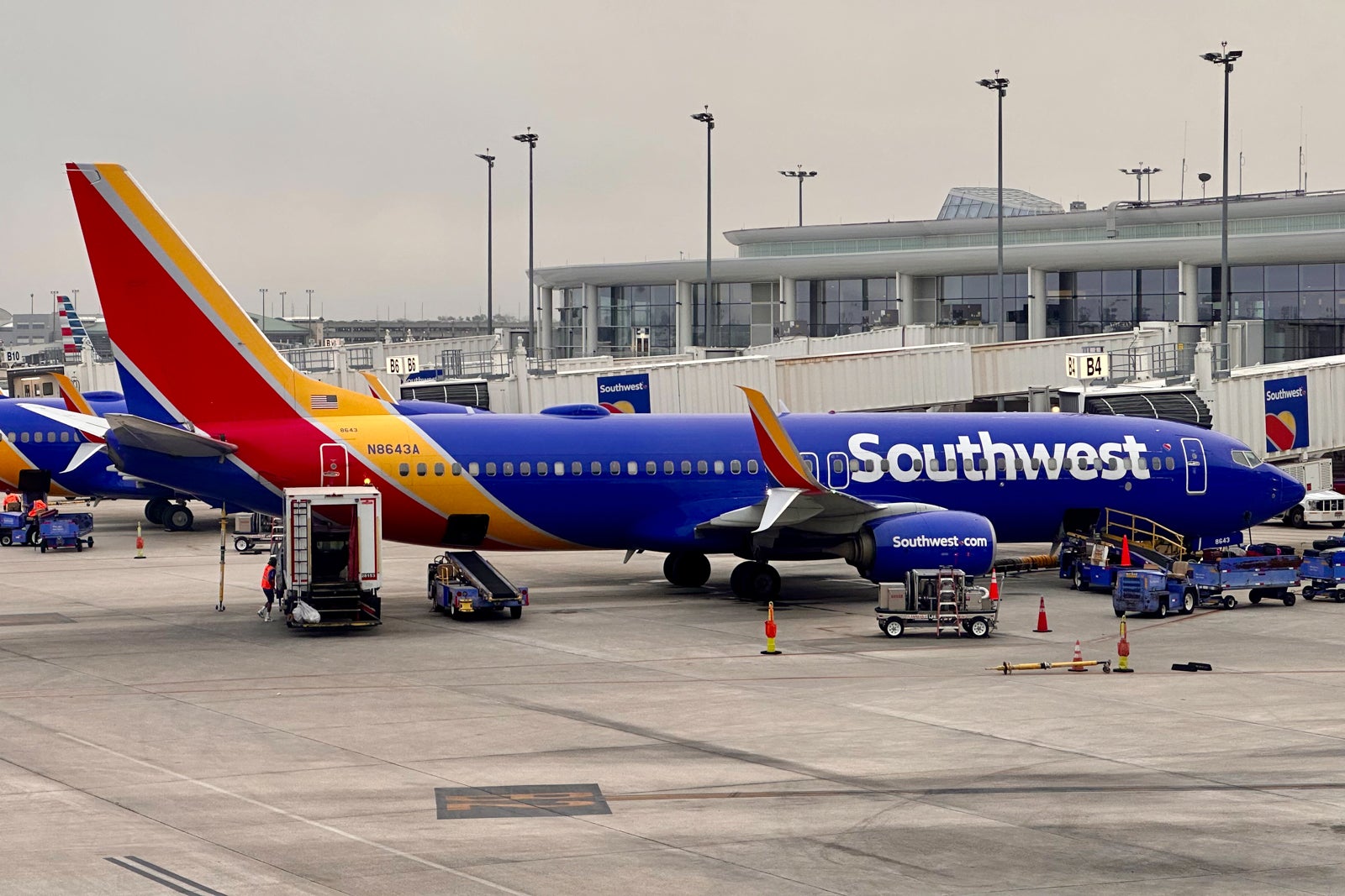 Southwest plane parked at an airport gate