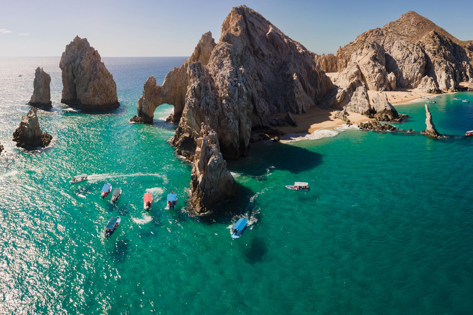 Downward Looking Aerial of the shallow water in Cabo San Lucas, Baja California Sur, Mexico near the Darwin Arch glass bottom boats viewing sealife