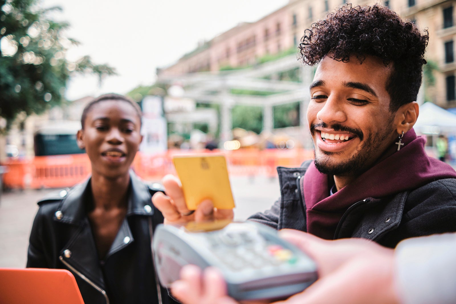 man spending credit card