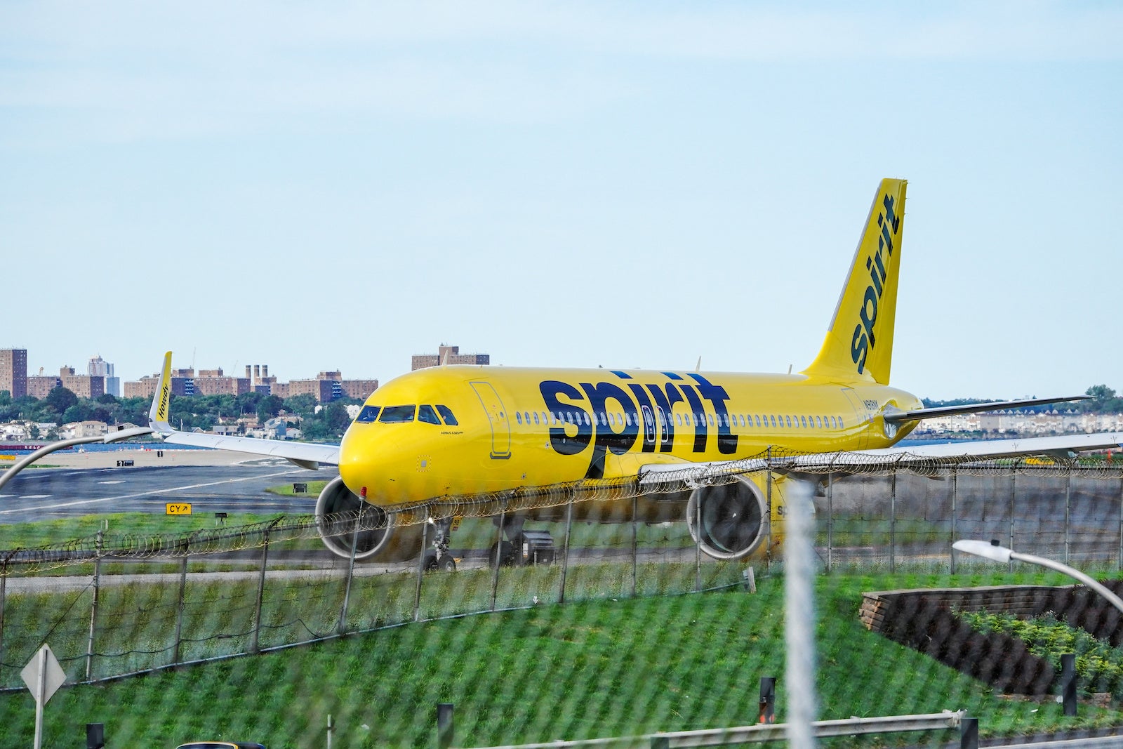 Spirit Airlines jet on the runway at New York LaGuardia Airport
