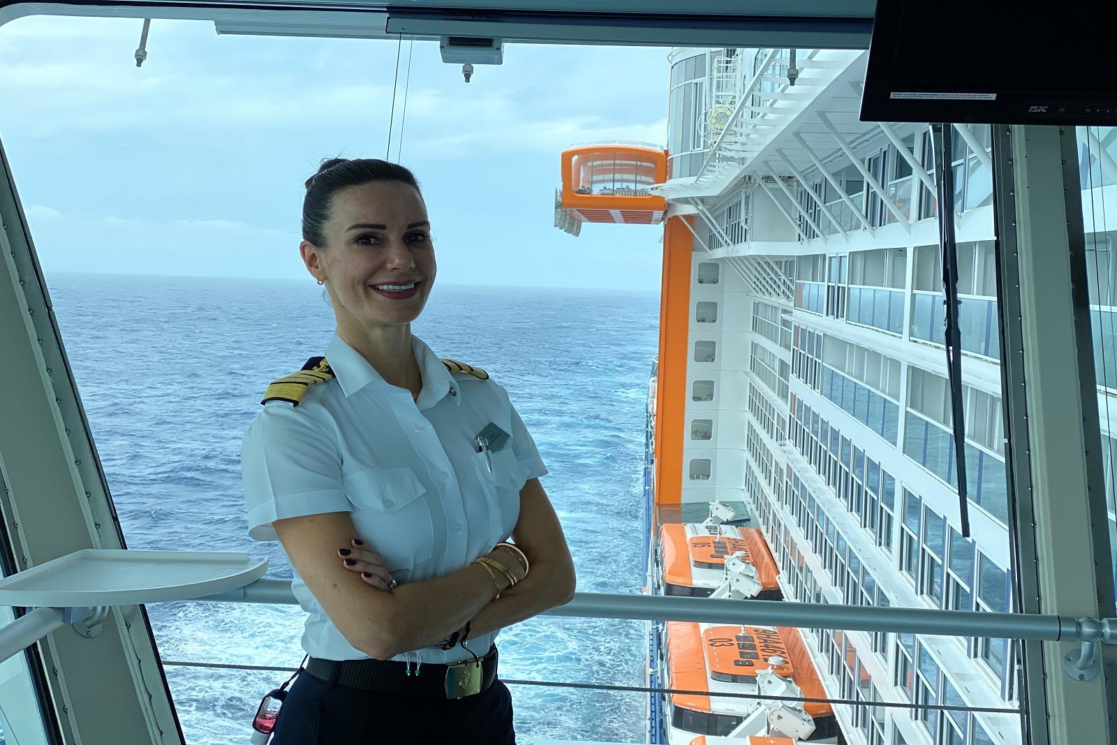 Captain Kate poses on the bridge of a Celebrity Cruises ship.