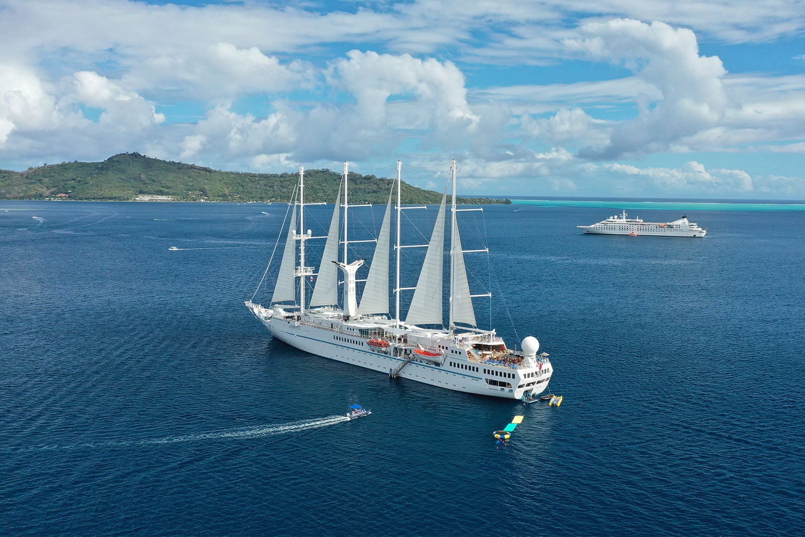 Masted cruise ship in French Polynesia