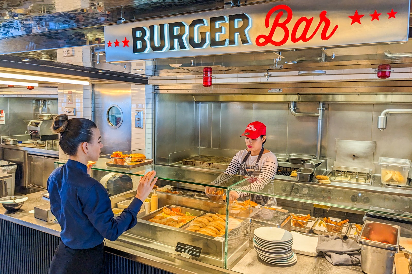 Burger Bar counter with chef and server