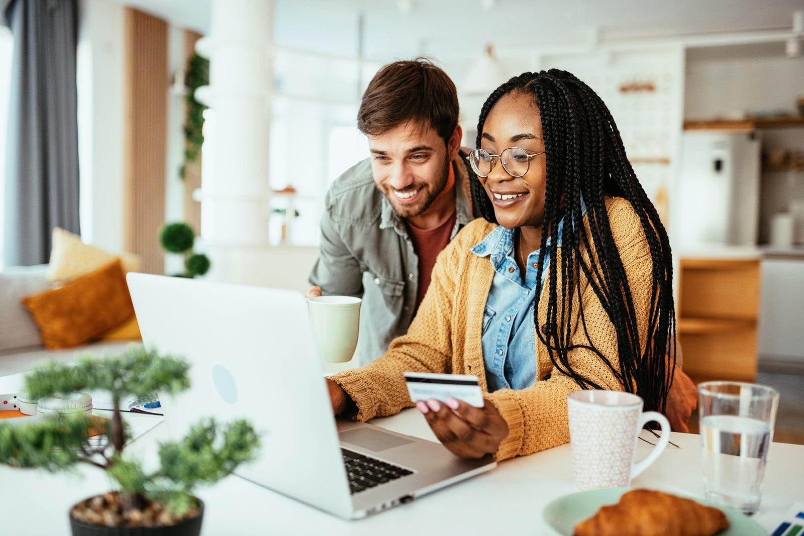 Couple using a credit card