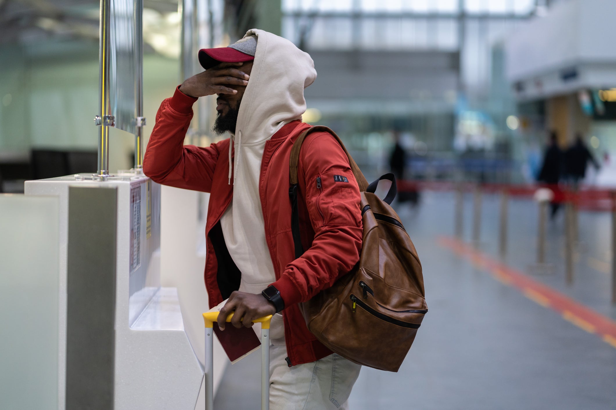 stressed man at airport