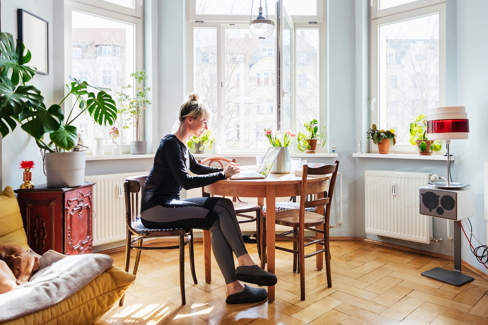 Woman using a laptop at home