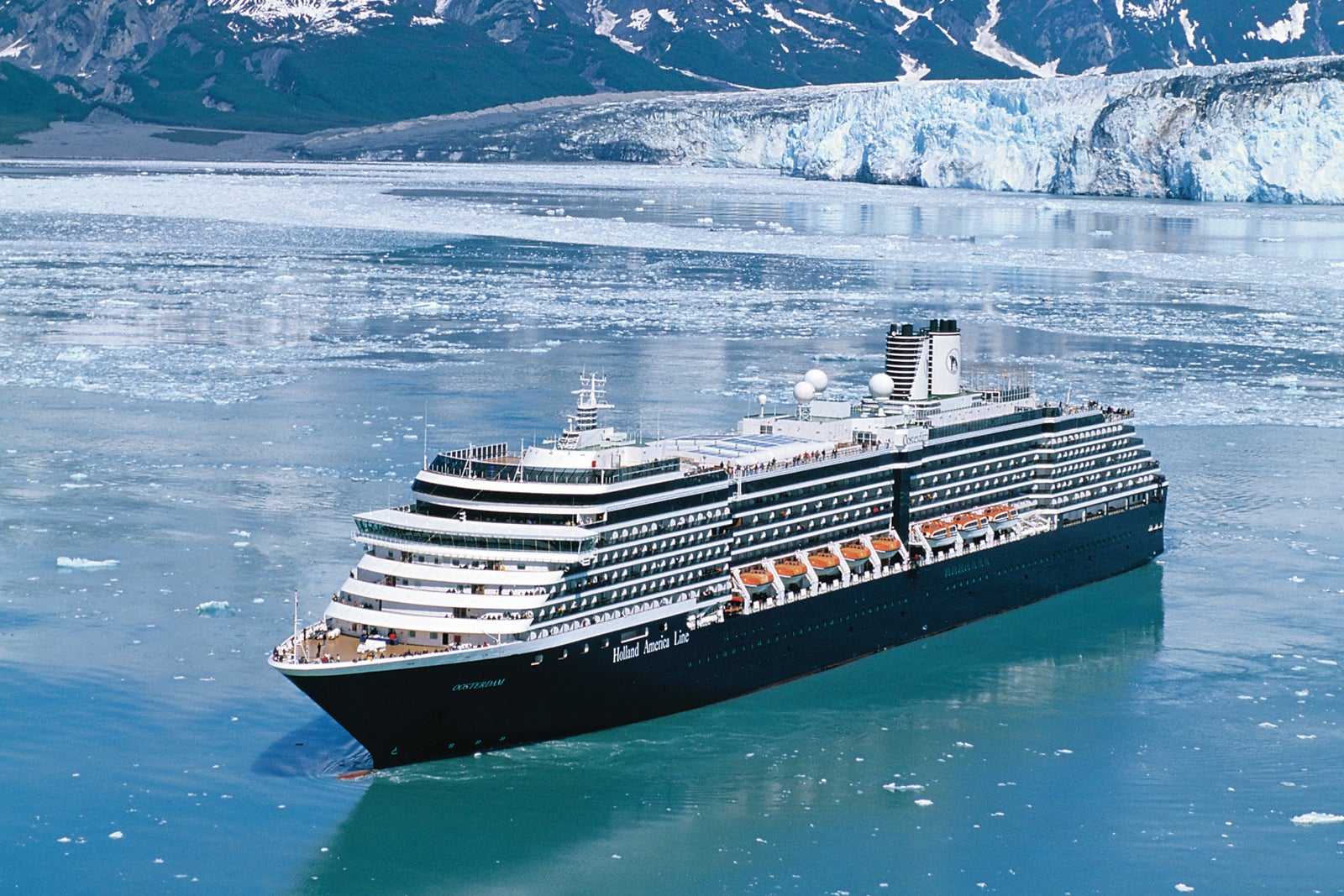 Cruise ship in icy waters with Hubbard Glacier behind