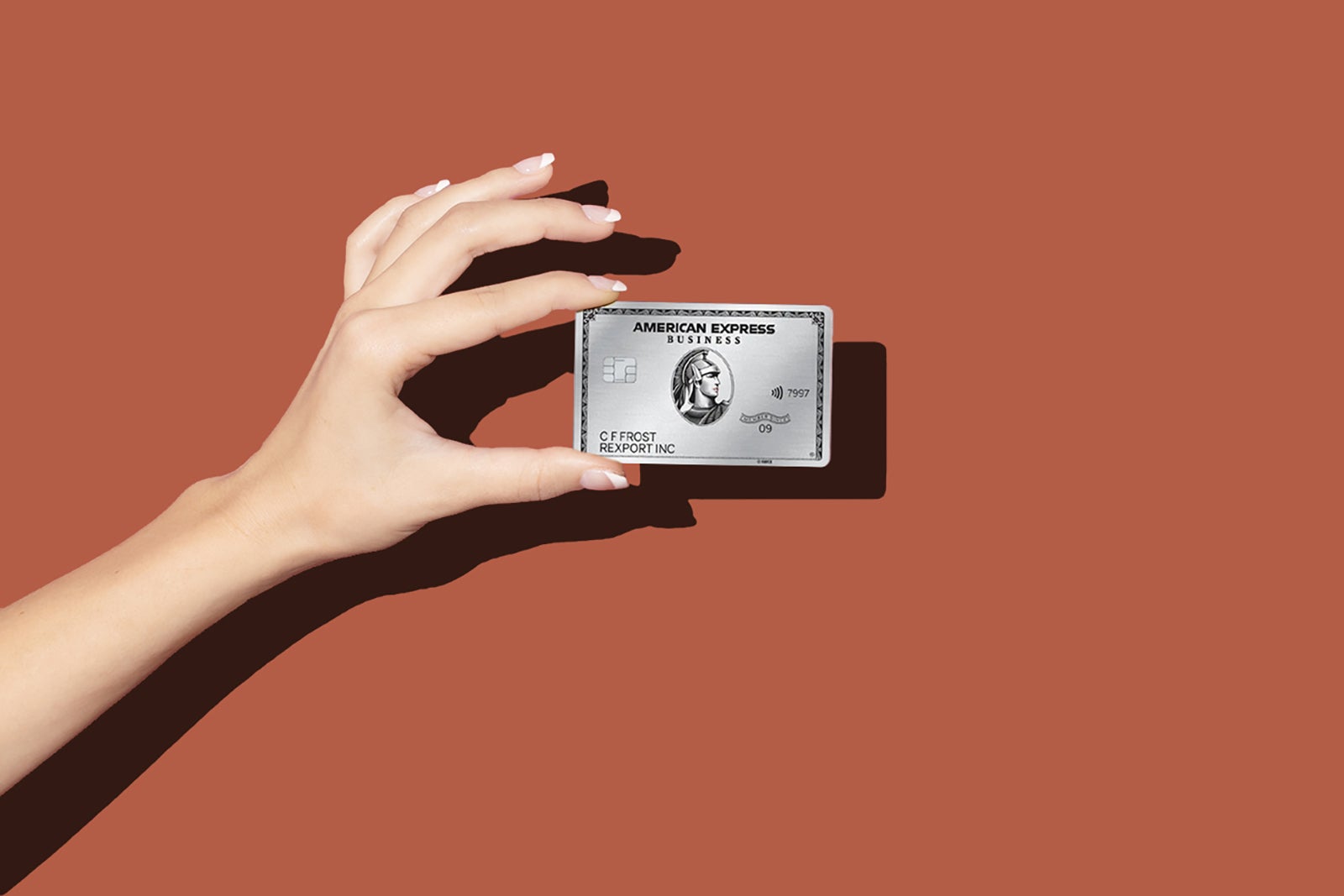hand holding an amex card