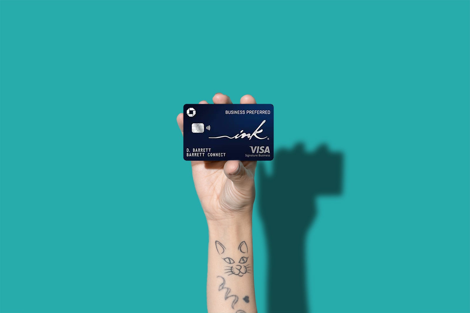 hand holding an Ink credit card