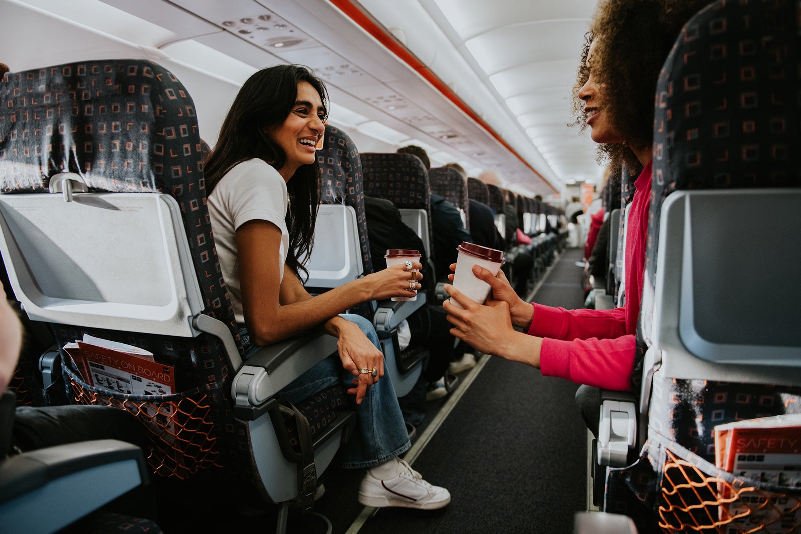 Airline passengers talking during flight