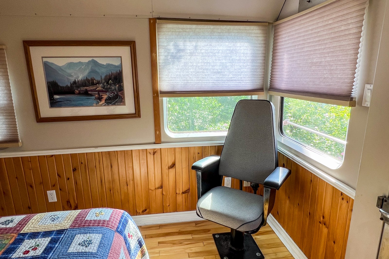 A conductors chair in the bedroom of Caboose #8 at the Train Station Inn in Tatamagouche, Nova Scotia