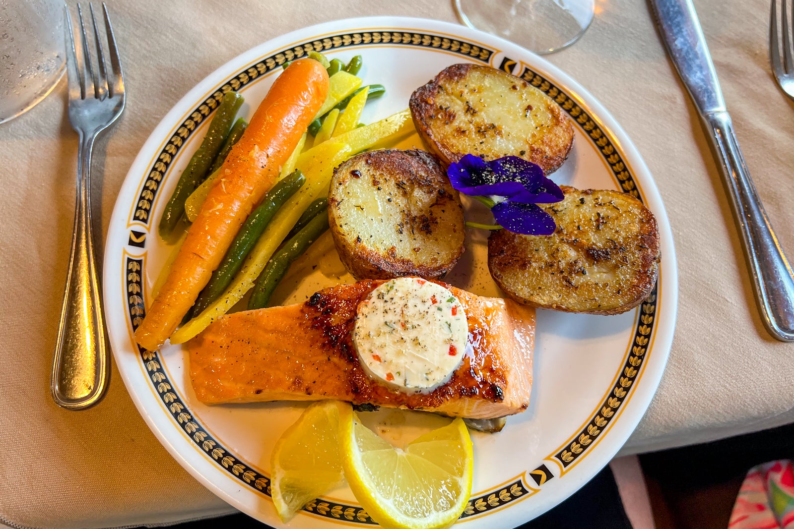 Salmon, potatoes and vegetables in the dining car at the Train Station Inn in Tatamagouche, Nova Scotia
