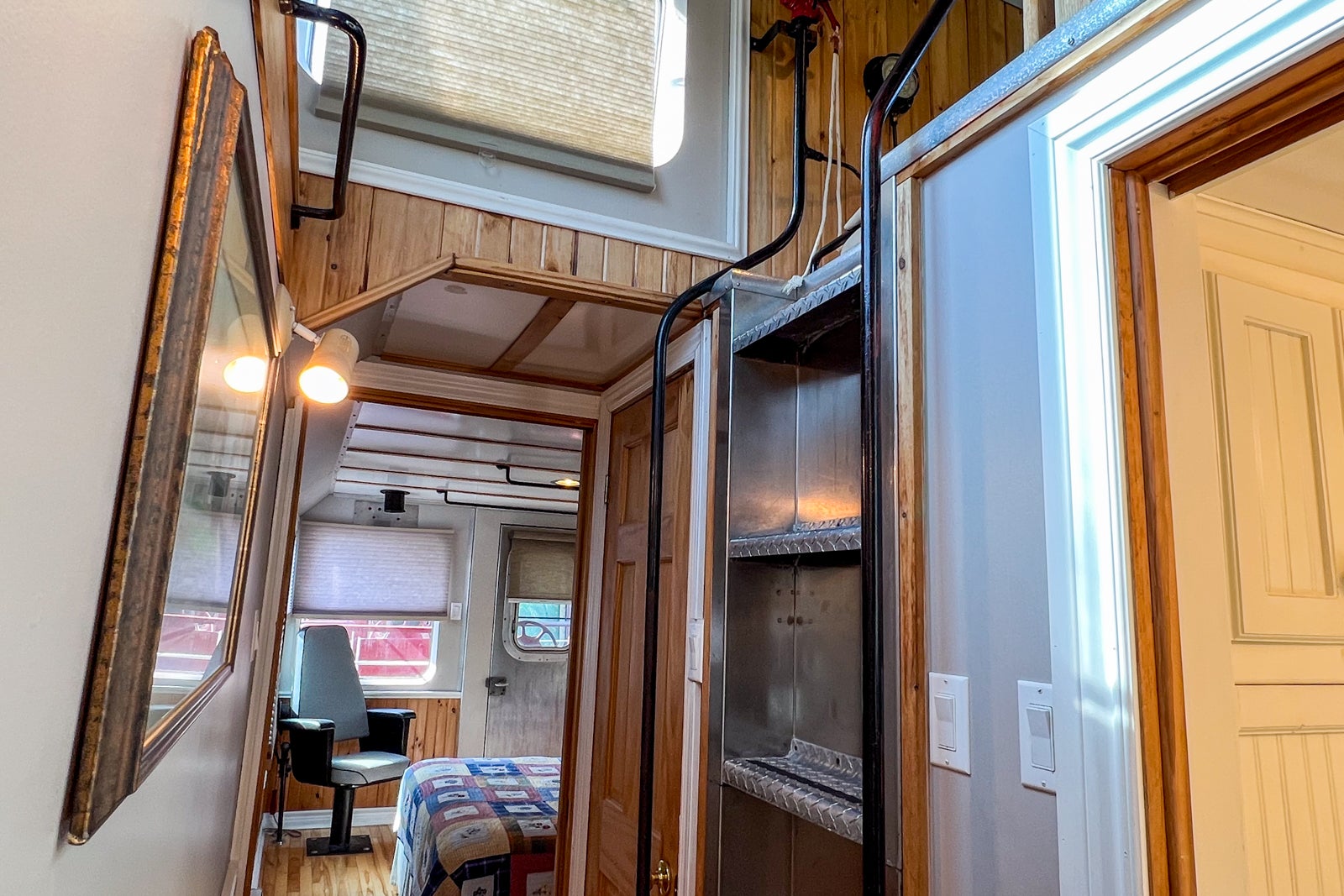 The hallway and stairs to the cupola of Caboose #8 at the Train Station Inn in Tatamagouche, Nova Scotia