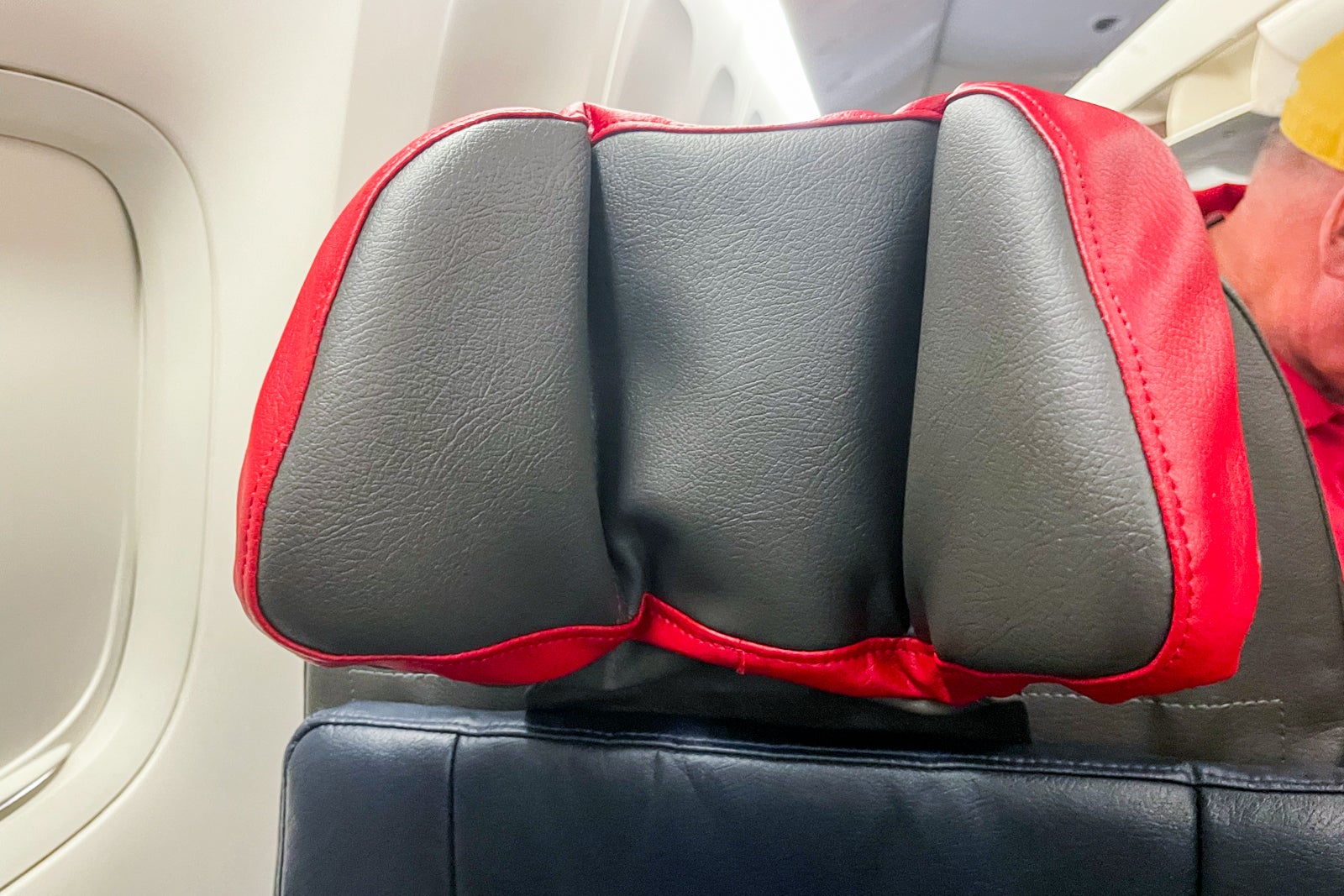 Curling headrest on American Airlines