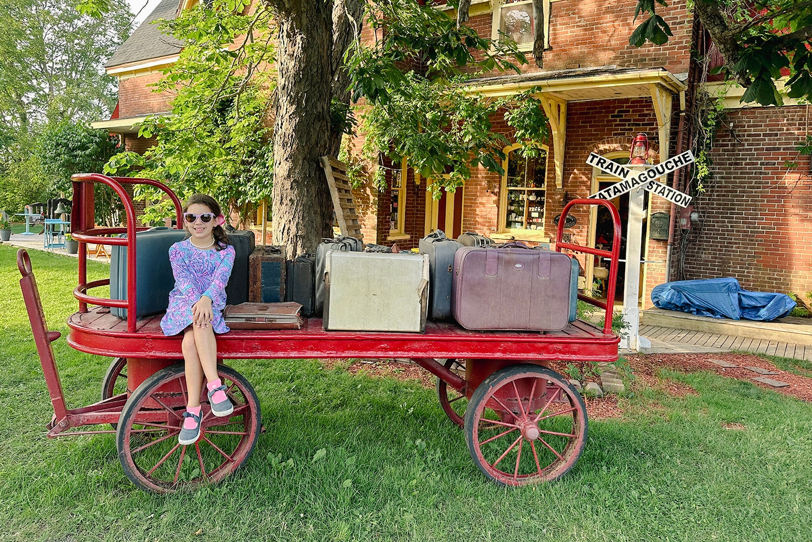 Nick Ewen's daughter outside the Train Station Inn in Tatamagouche, Nova Scotia