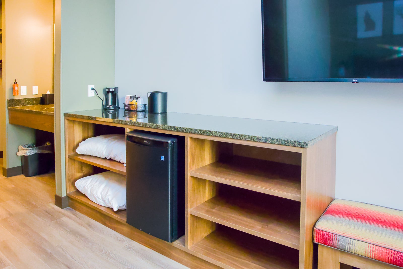 Storage and mini-fridge in Wolf Den Suite at Great Wolf Lodge Maryland