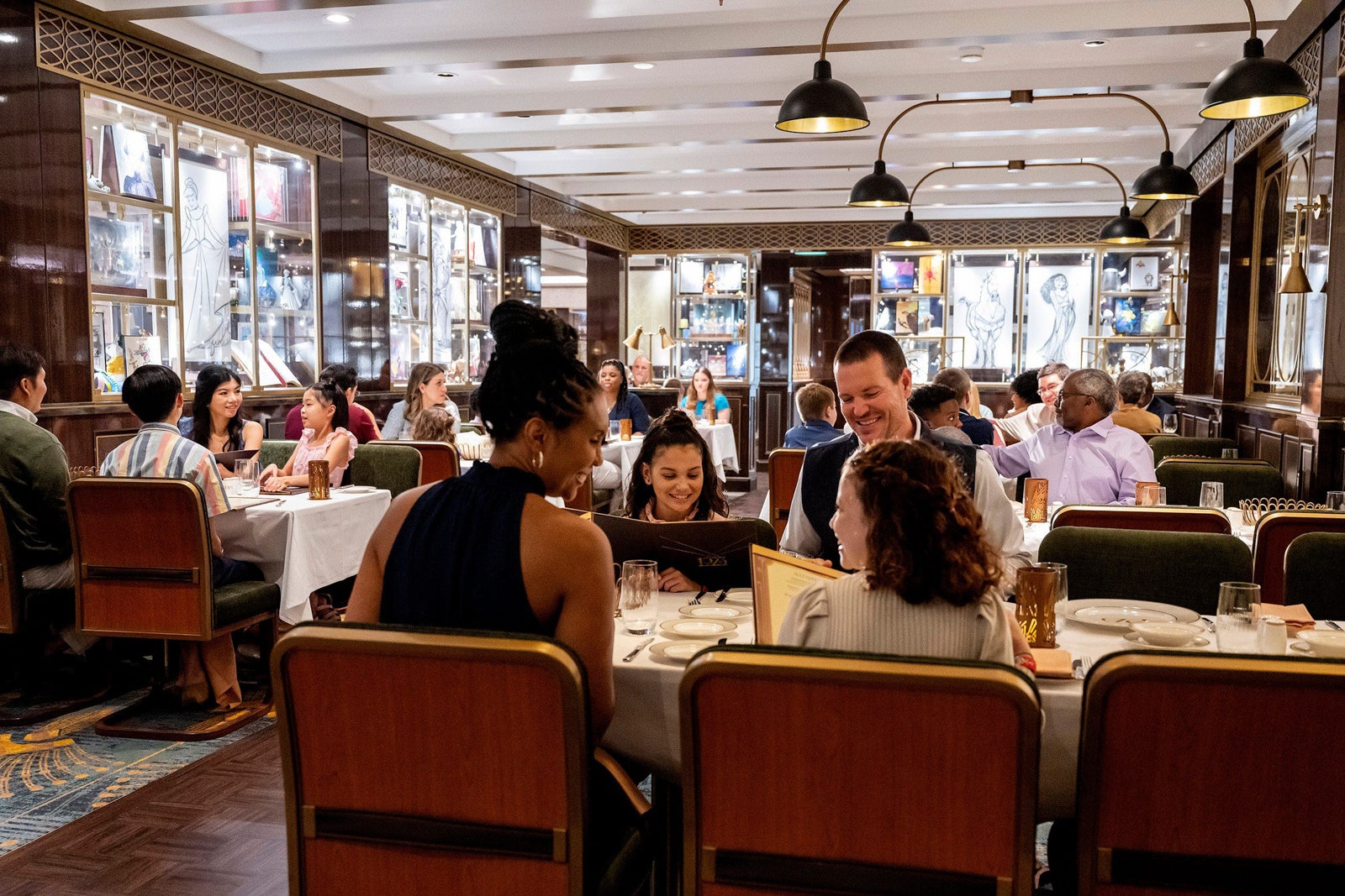 Family dining at 1923 restaurant on Disney Cruise Ship.