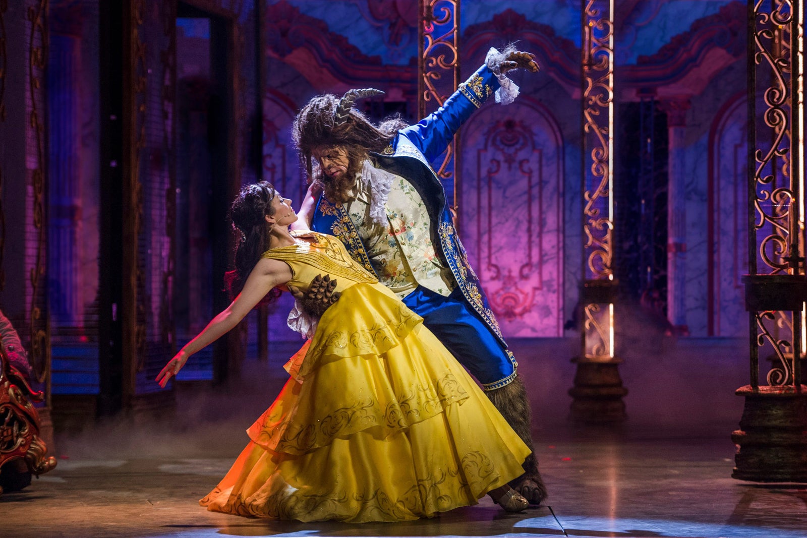 Cast perform dance number in “Beauty and the Beast” musical.