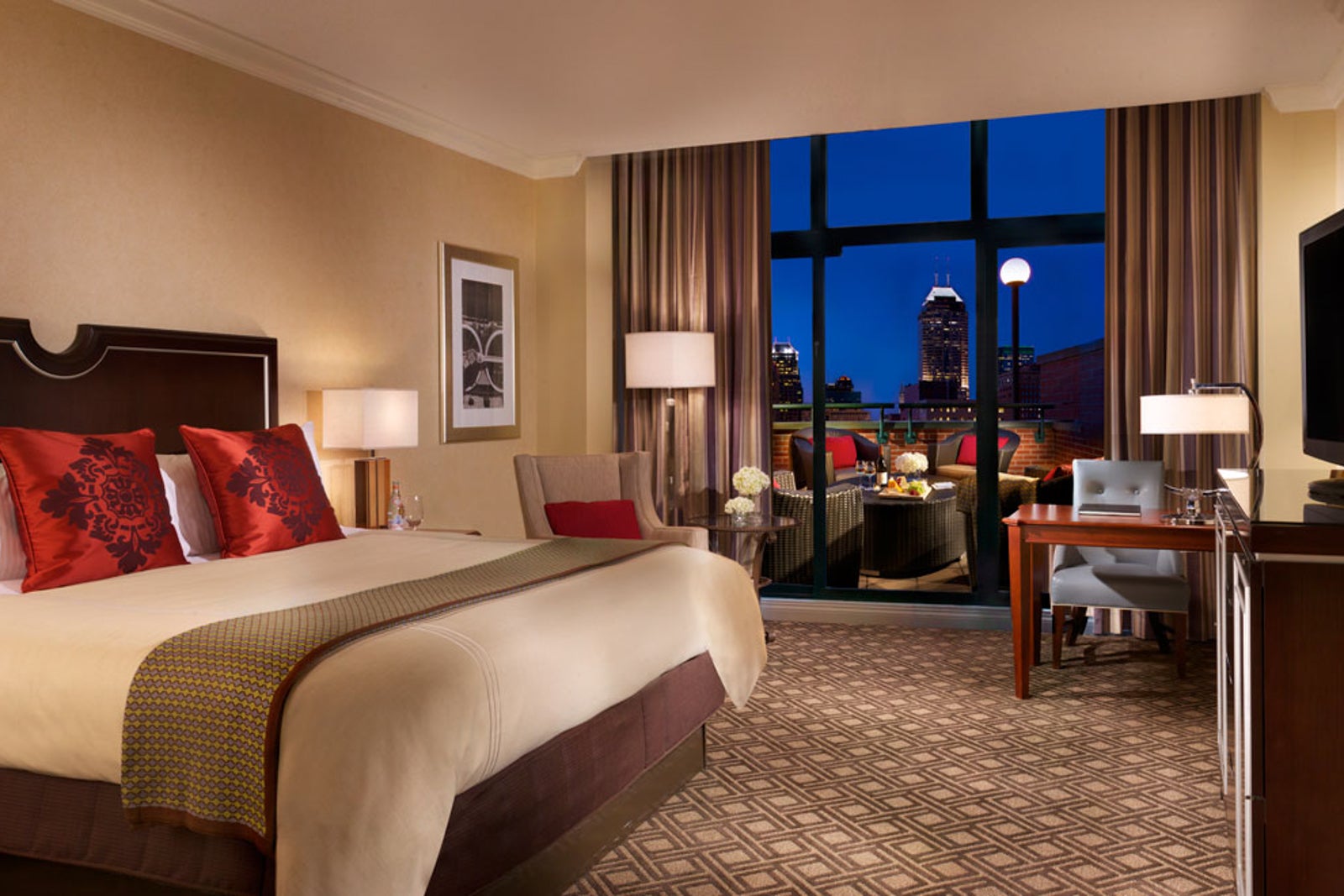 guest room with terrace and view of Indianapolis at the Omni Severin Hotel