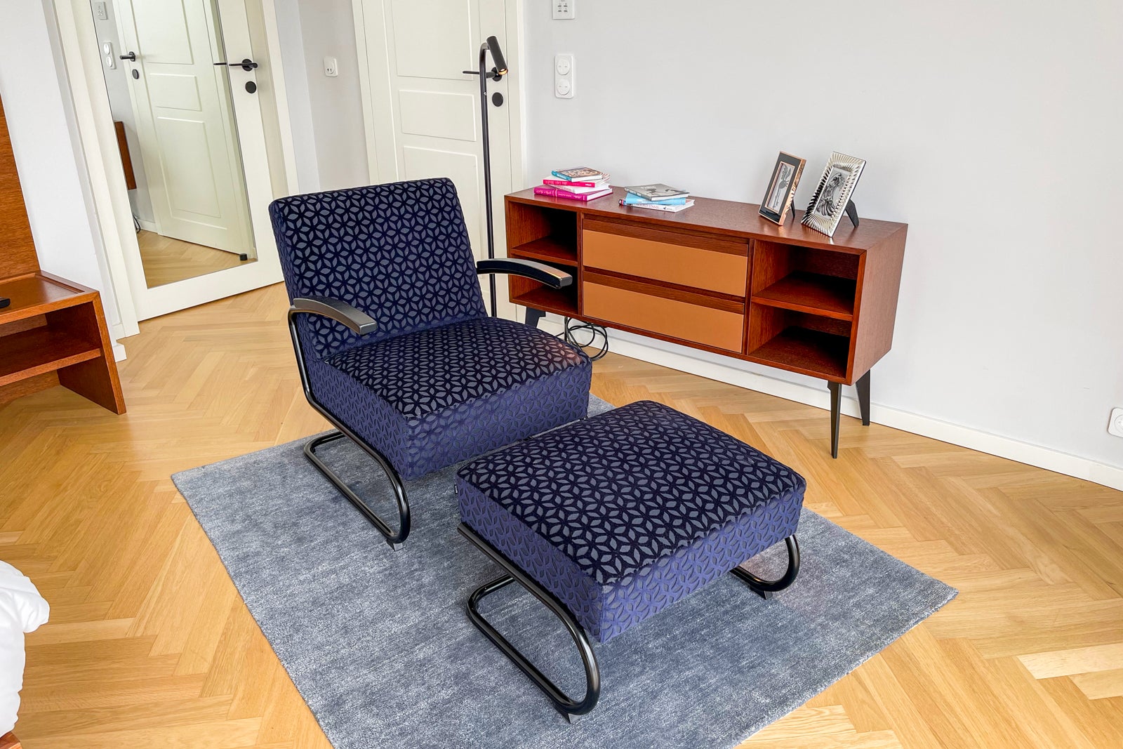 chair, ottoman and reading lamp in Andaz Vienna Executive Suite bedroom