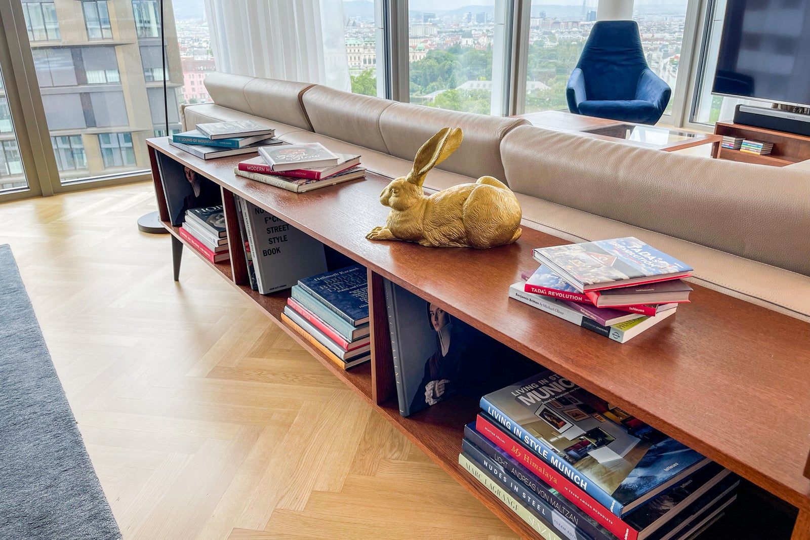 A shelf of books at the Andaz Vienna Executive Suite
