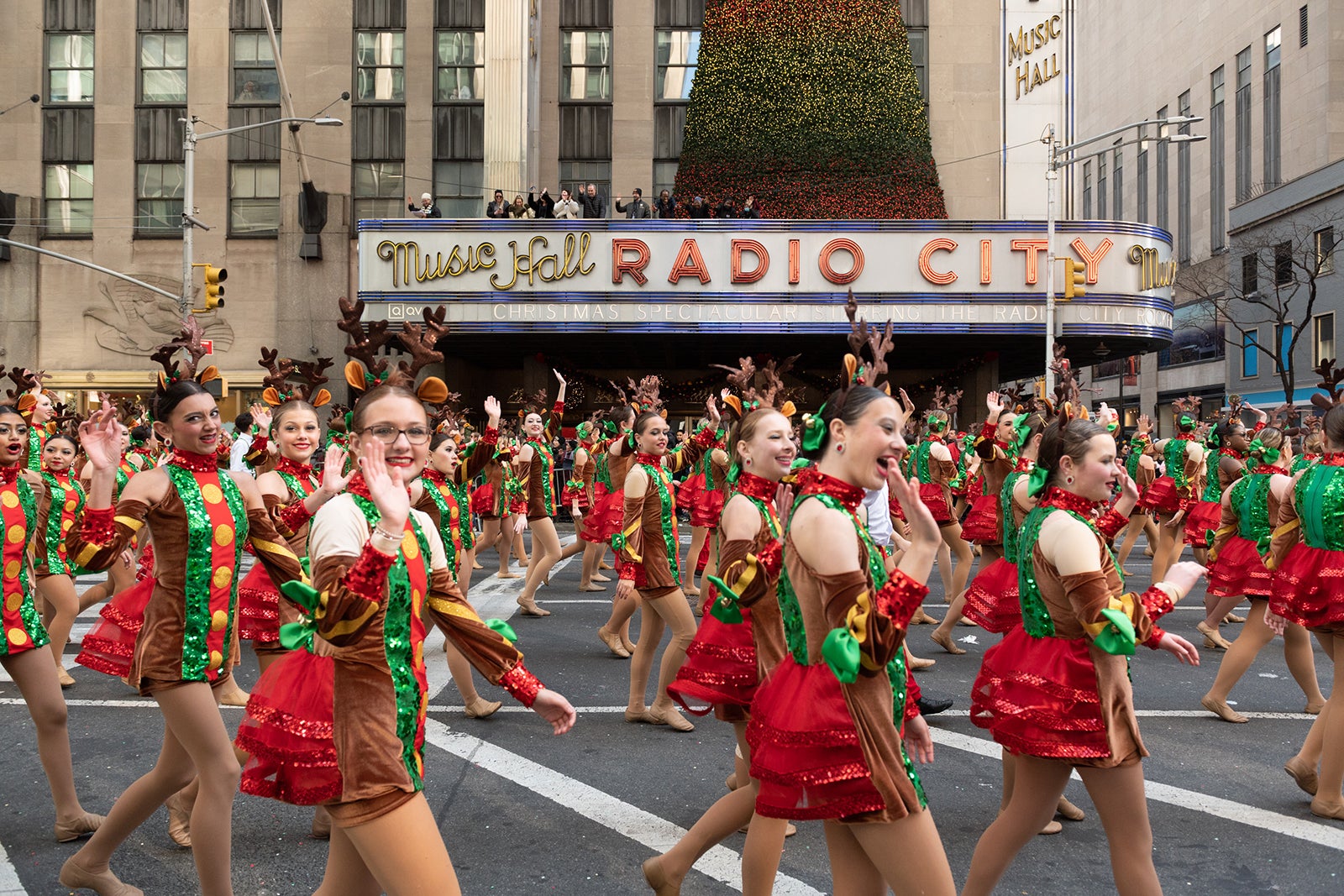 Dancers parade past by Radio City Music Hall during the 2022 Macy's Thanksgiving Day Parade on Nov. 24, 2022, in New York City. 