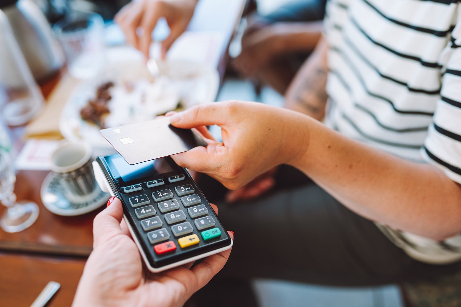 Person paying with credit card