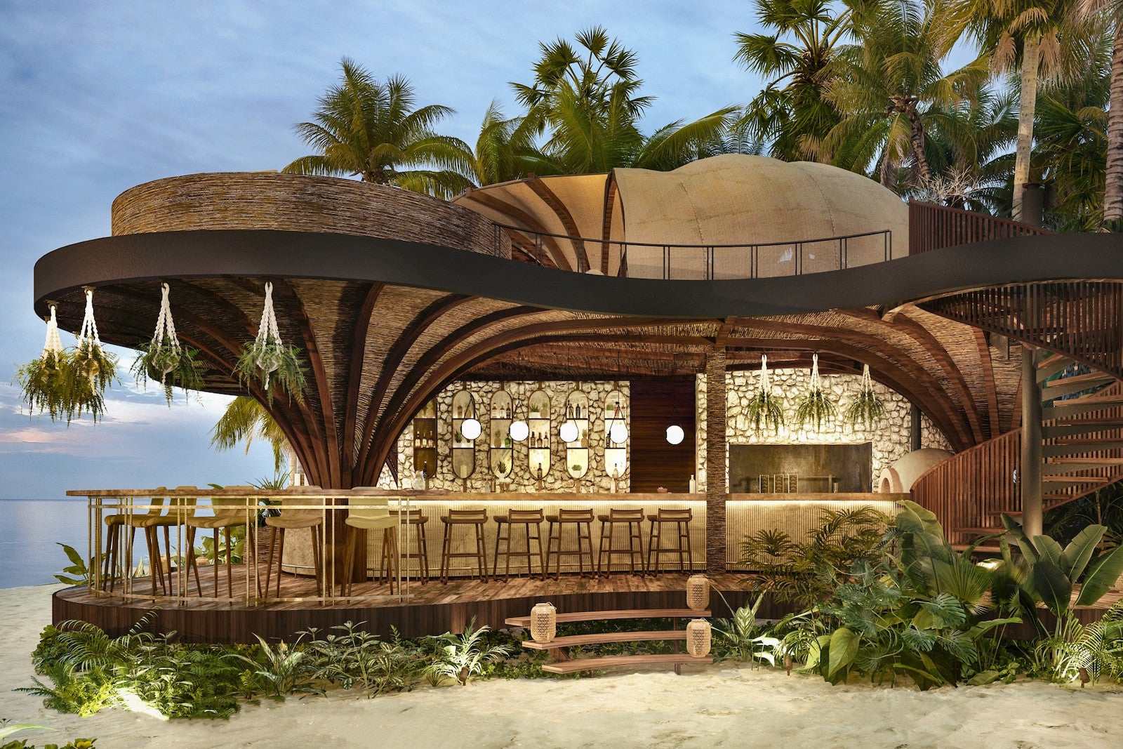 large wooden building with curved bar in sand and beach in the background