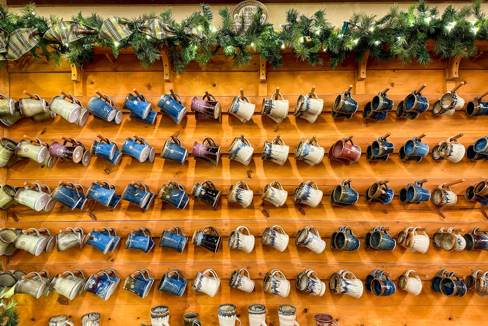 mugs hanging on a wall