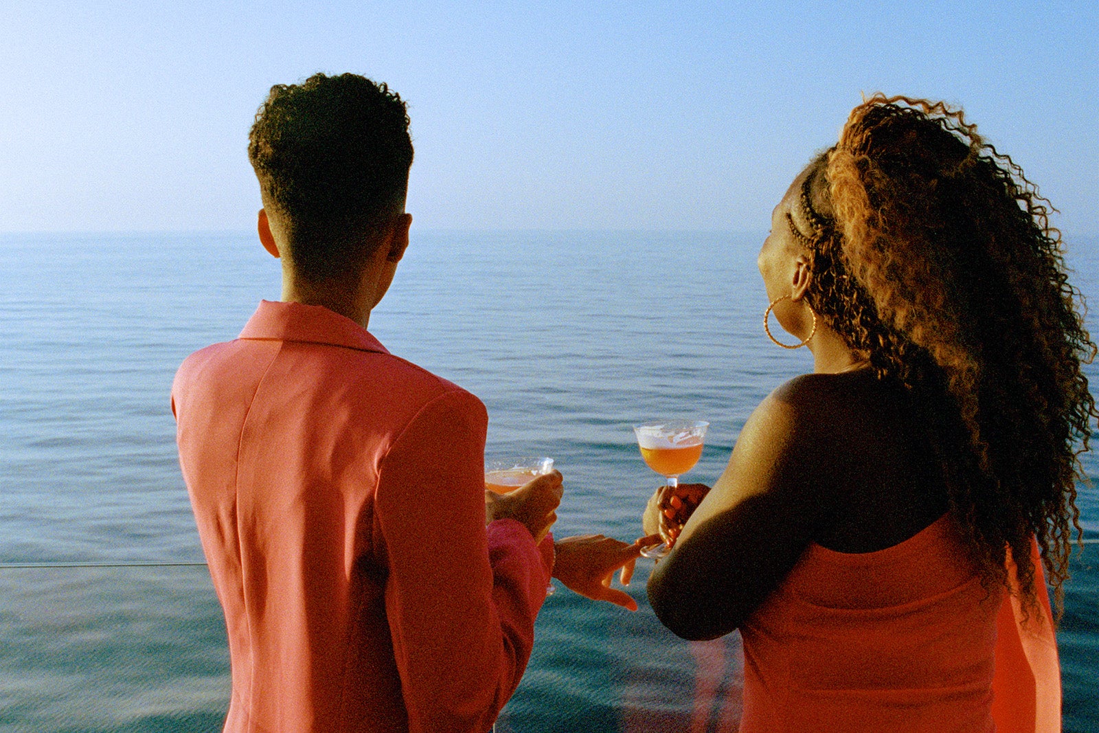 Couple enjoys a drink on cruise ship
