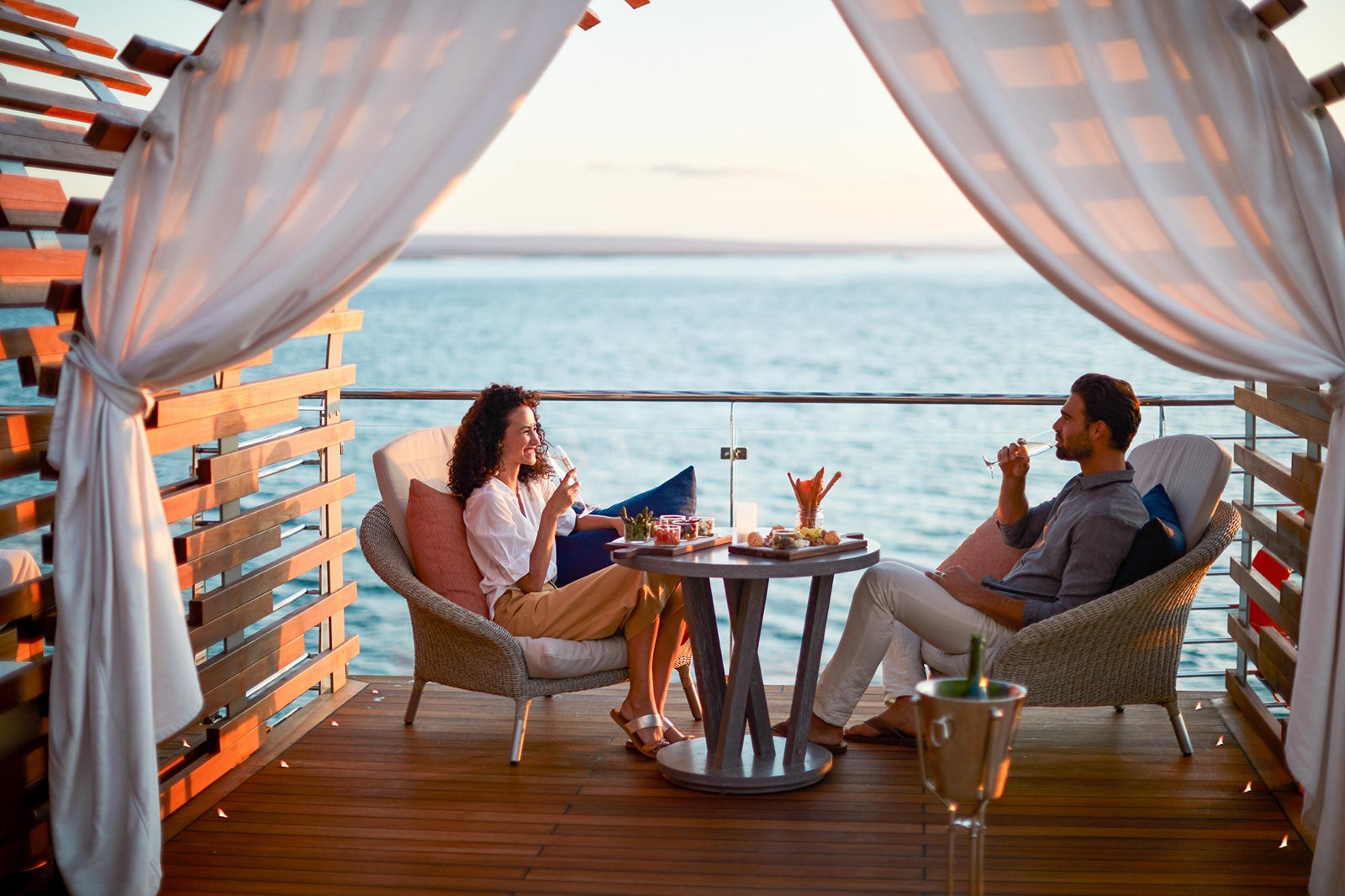 Couple having a meal on a cruise ship balcony