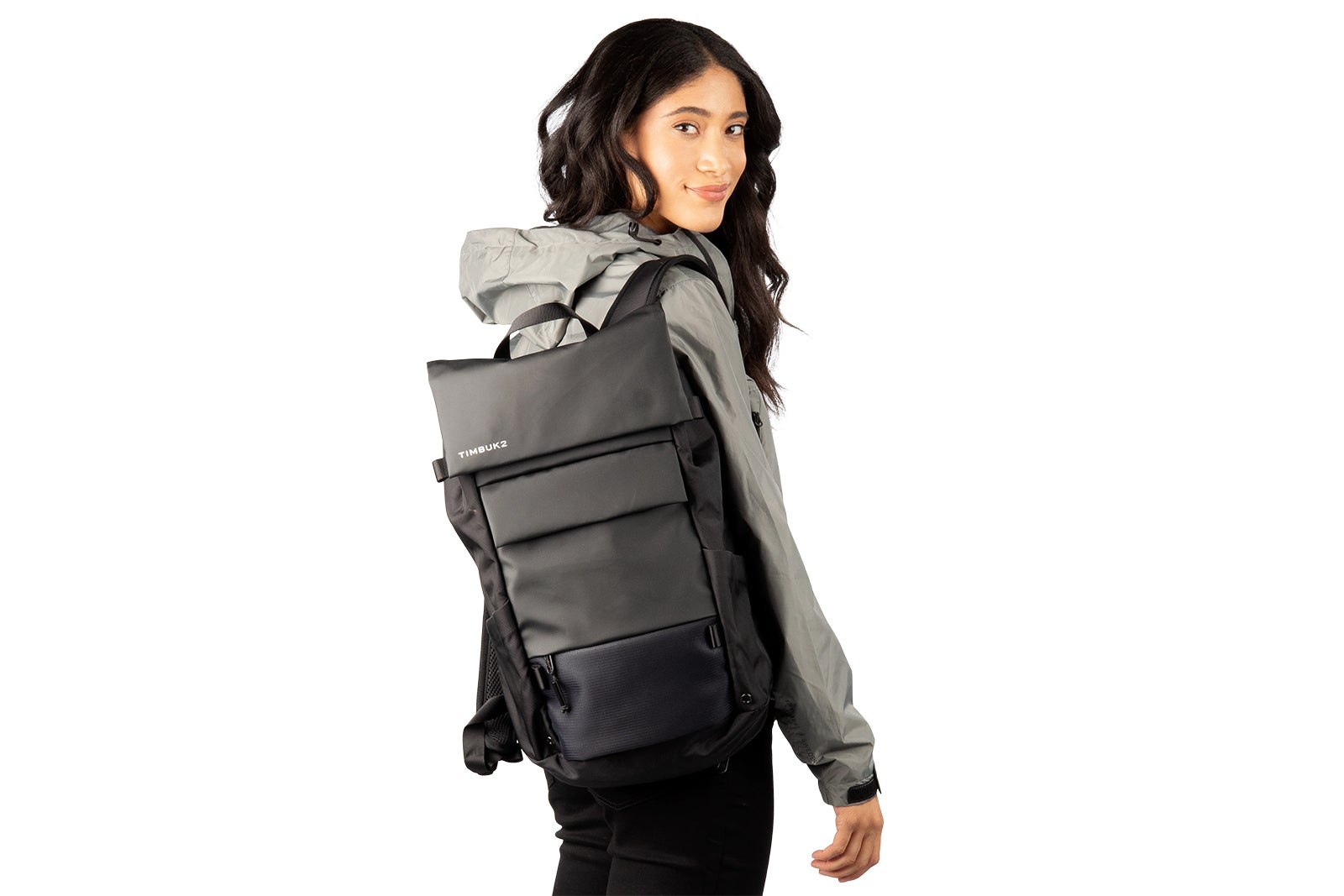 Woman wearing a Timbuk2 commuter backpack