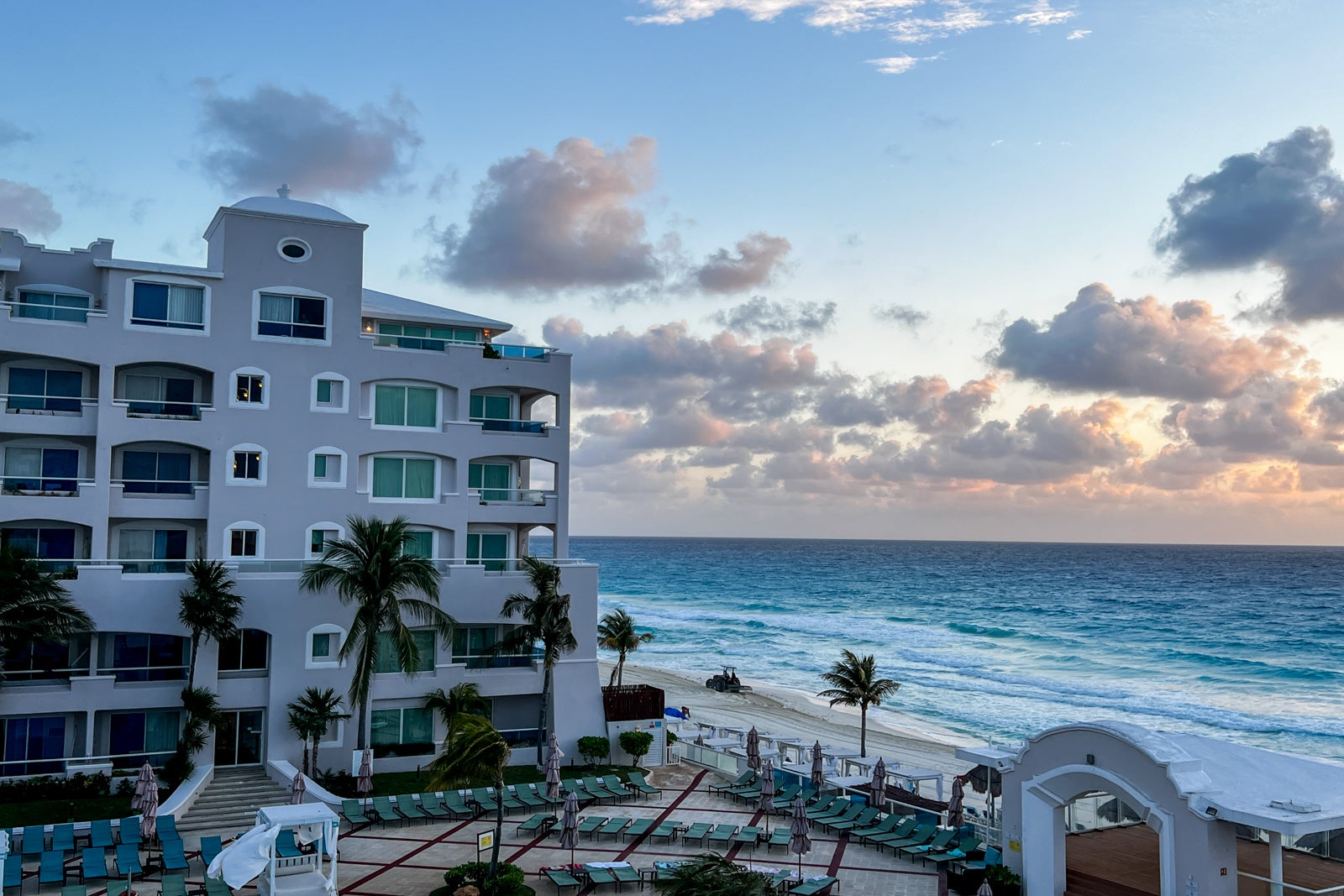 A beachside view of the Wyndham Alltra Cancun All Inclusive Resort