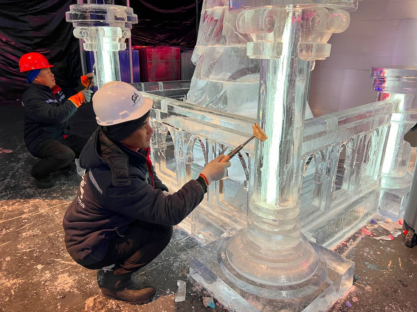 Ice carvers working on an Ice! display