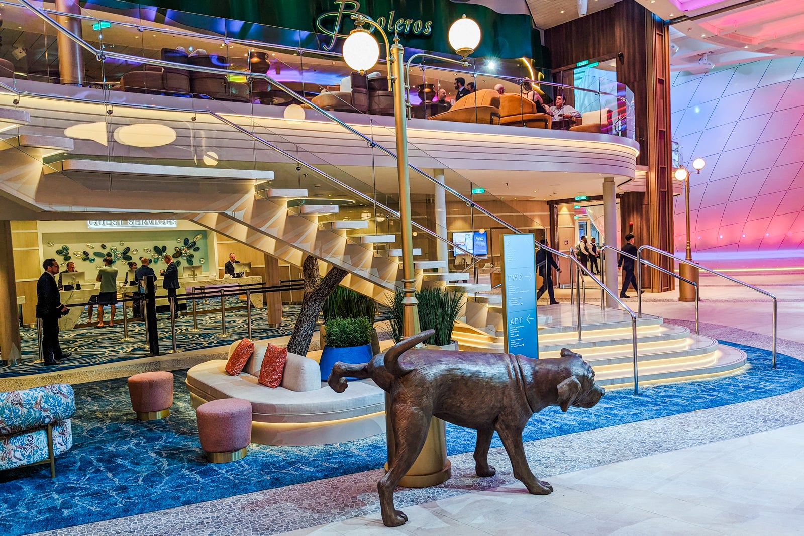 Statue of dog peeing on a lamppost on Icon of the Seas