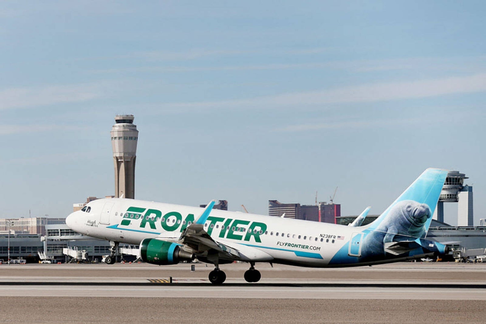 A Frontier aircraft lands at Las Vegas' Harry Reid International Airport