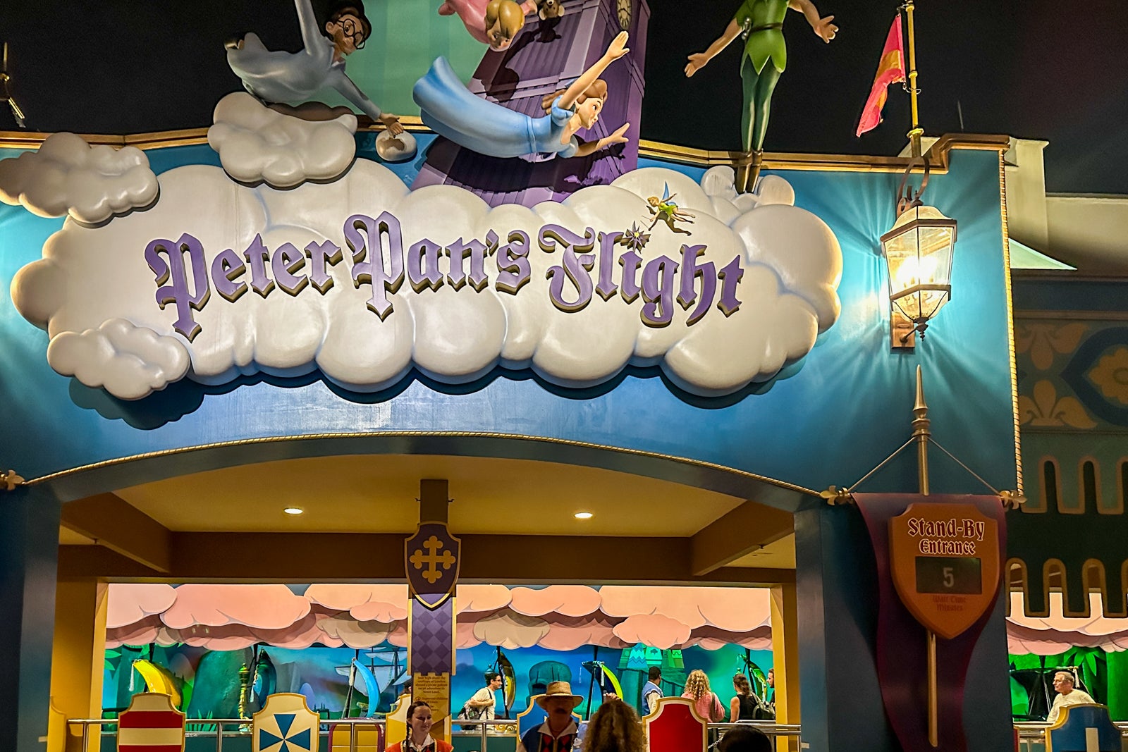 Peter Pan's Flight with a five-minute wait time.