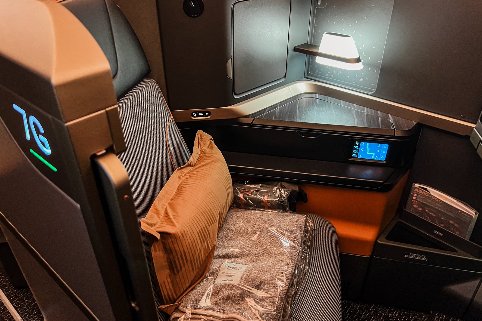 Business-class seat on Starlux. 