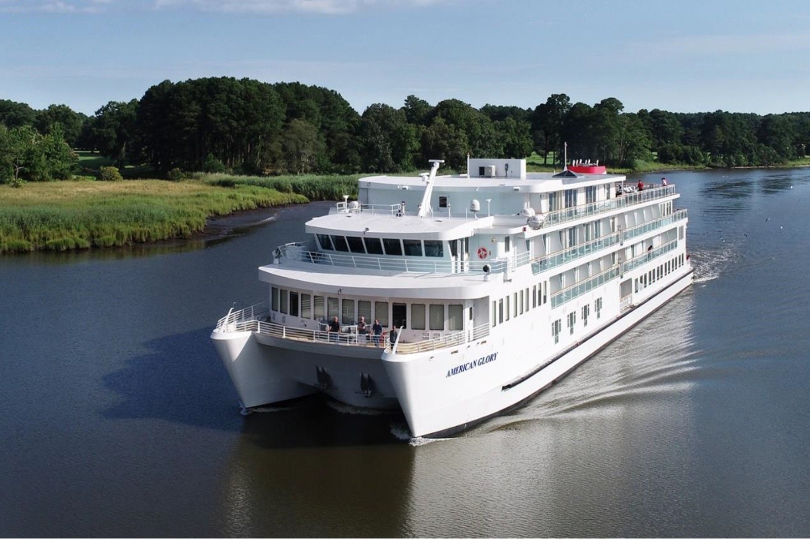 A white catamaran cruise vessel