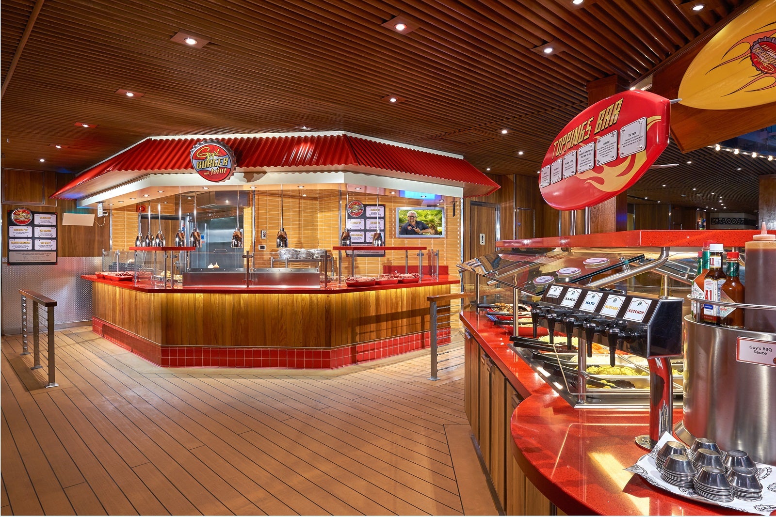 A counter service burger stand and toppings bar on a cruise ship