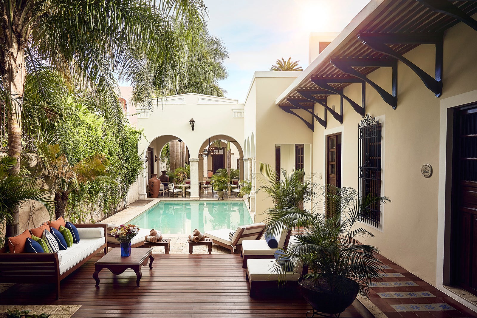 courtyard with a pool in a tropical location 