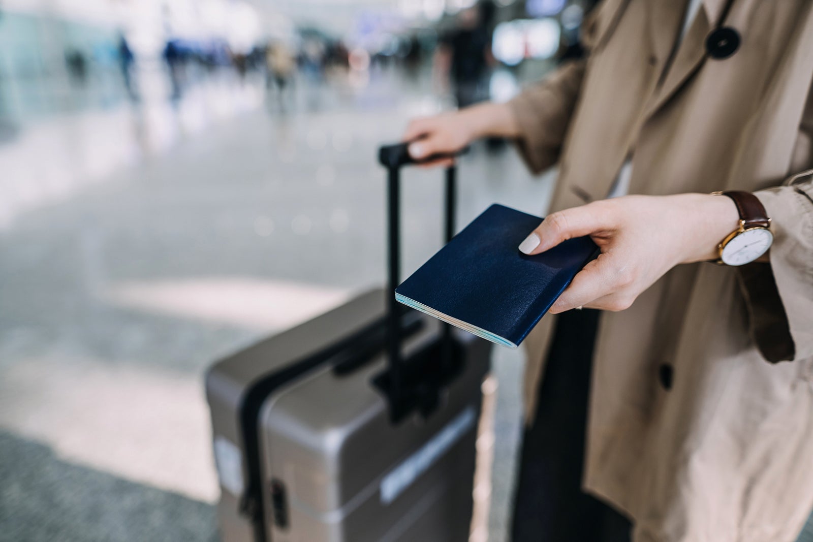 Person traveling with suitcase