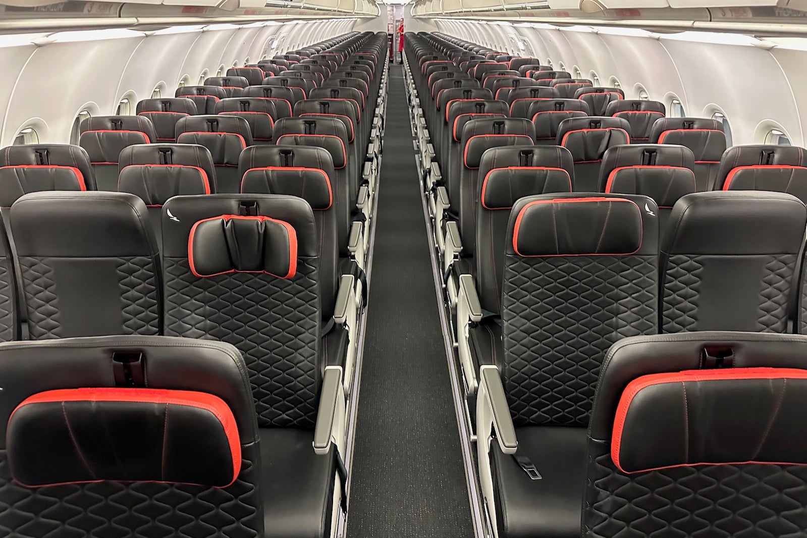 empty rows of seats inside Avianca plane