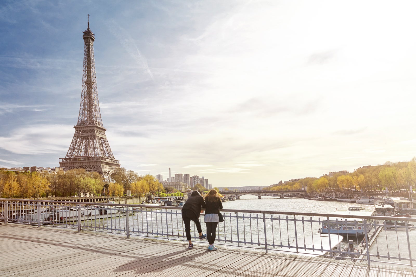 Tourist couple looking at The Eiffel Tower in Paris, France