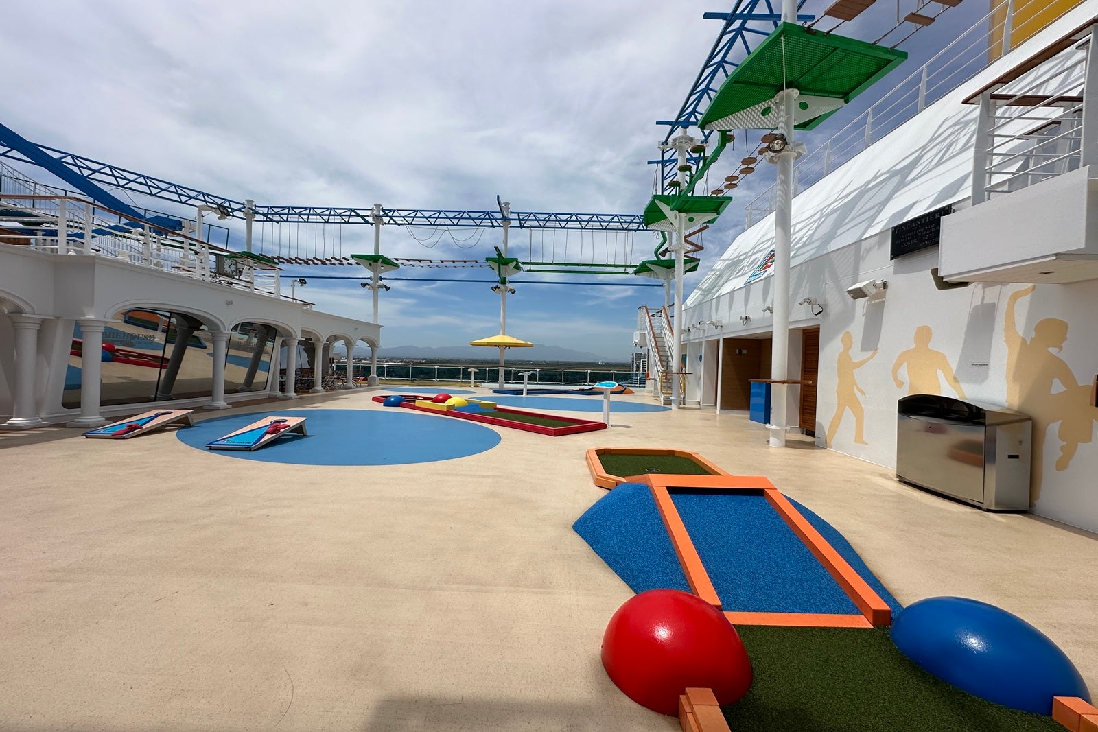An empty miniature golf course and ropes course on a cruise ship