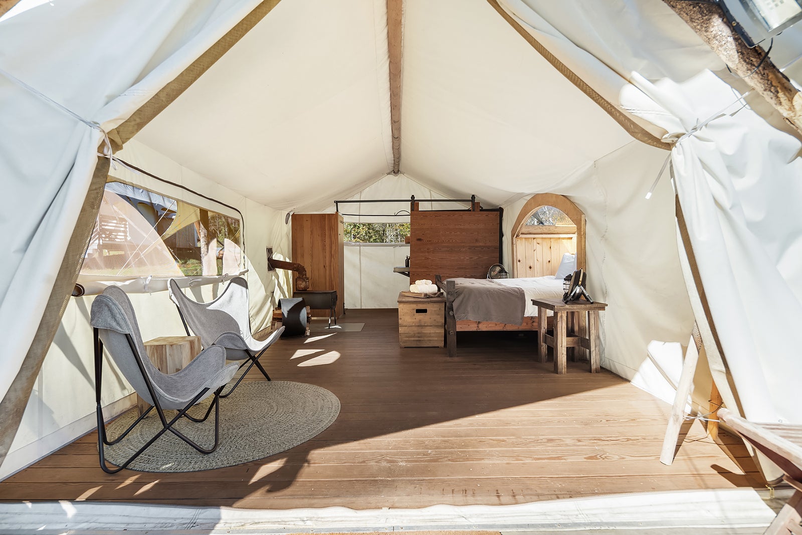 inside a white glamping tent