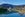 Panorama of Nelson City, reflected in the Maitai River, New Zealand.