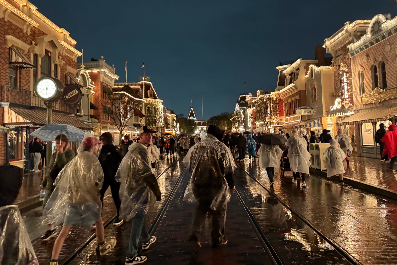 people in rain ponchos